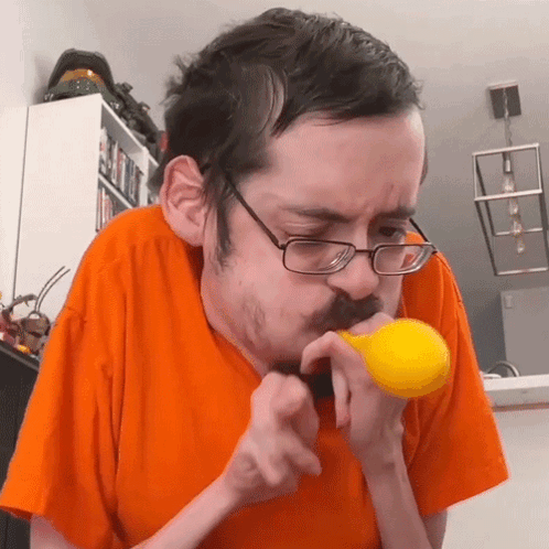 Trying To Blow A Balloon Ricky Berwick GIF - Trying To Blow A Balloon Ricky Berwick Failed To Blow Up A Balloon GIFs
