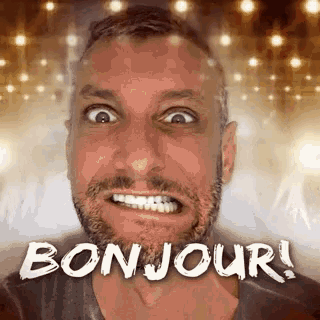 a man with a beard is making a funny face in front of a sign that says bonjour