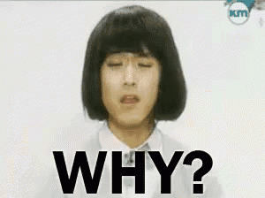 a man with a wig and glasses says why