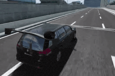 a black car is driving down a highway with the trunk open