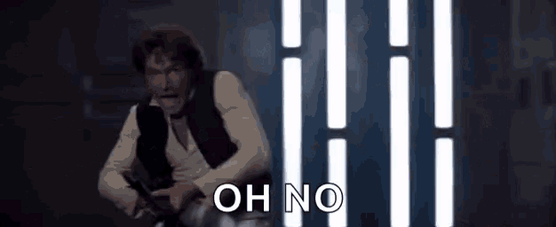 han solo is holding a gun and saying `` oh no '' in front of a wall of lights .