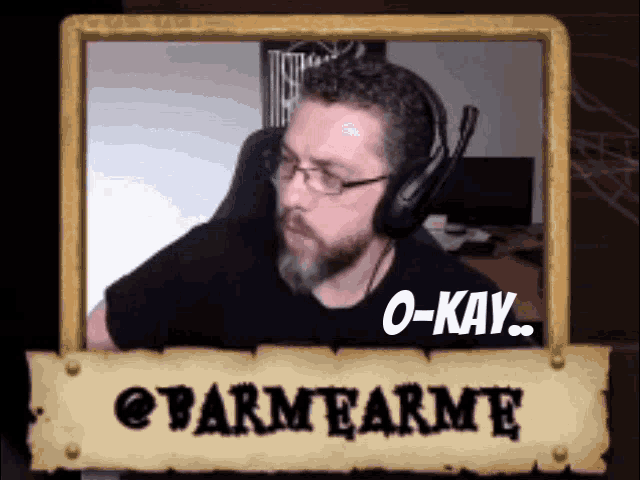 a picture of a man wearing headphones with the words o-kay on the bottom