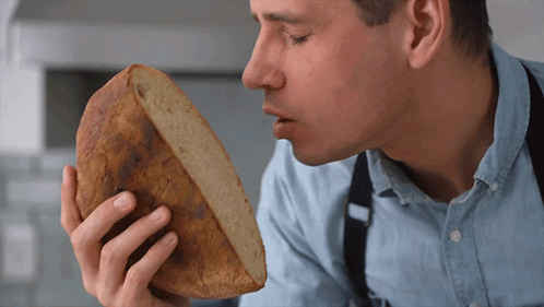 Kissing The Bread Brian Lagerstrom GIF - Kissing The Bread Brian Lagerstrom Smooching The Bread GIFs