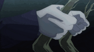 a close up of a person 's hands holding something