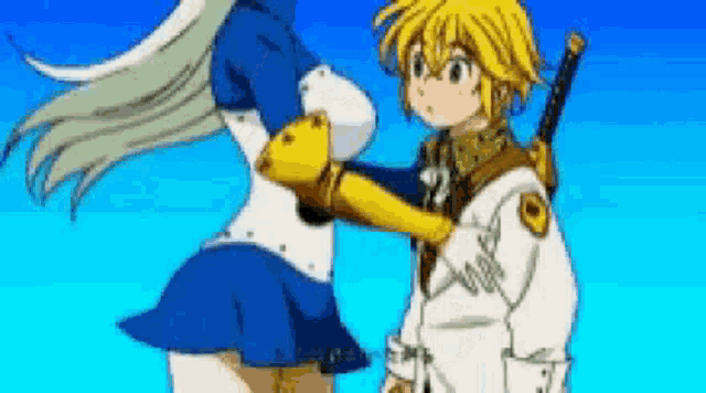 a man and a woman are standing next to each other .