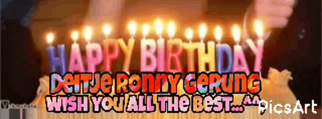 a birthday cake with candles that say happy birthday