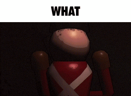 a toy soldier is hanging from a string with the word what above it .