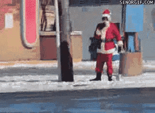 a pixelated image of santa claus standing on a snowy street