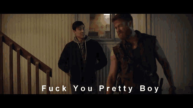 two men standing next to each other with the words fuck you pretty boy