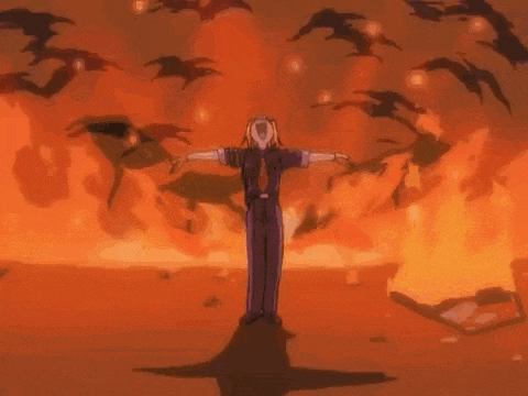 a scarecrow is standing in front of a flock of birds in a burning field .