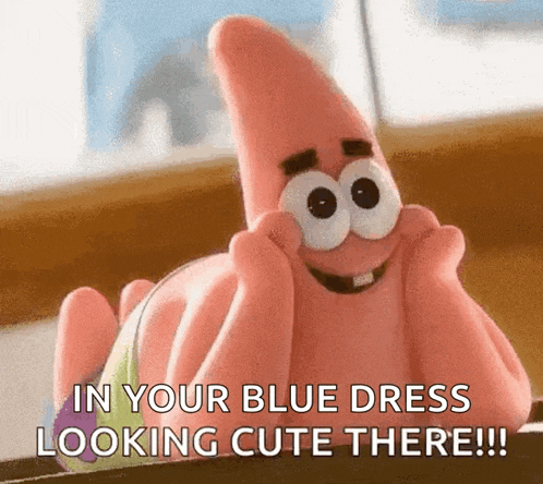 patrick star from spongebob squarepants is laying on a table with his hands on his face .