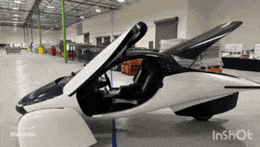 a white and black car with the hood open is created with inshot