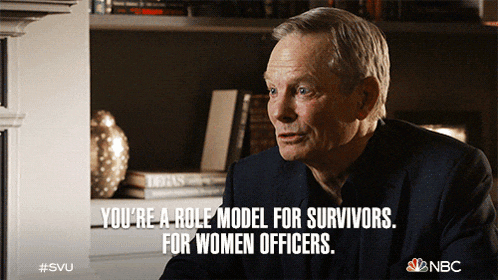 a man in a suit says you 're a role model for survivors