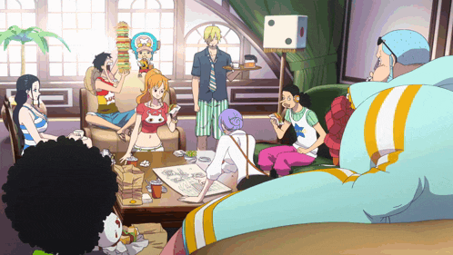 a group of people are sitting around a table with a dice on the wall