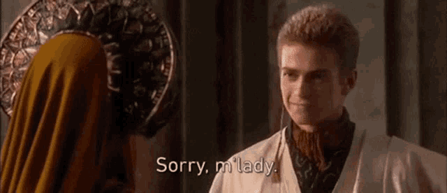 a man and a woman are standing next to each other and the man is saying `` sorry , m ' lady '' .