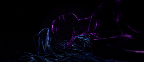 a drawing of a person with purple and blue lights