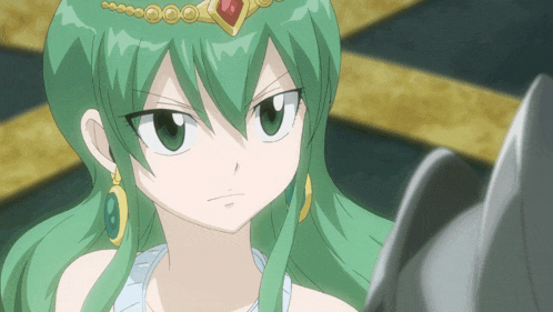 a girl with green hair is wearing a tiara
