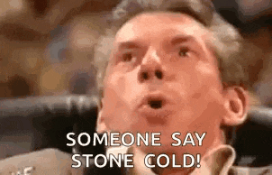 a man is sitting in a chair with his mouth open and someone says stone cold .