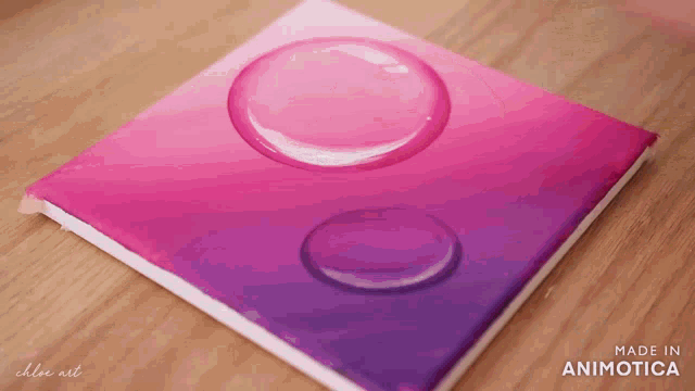 a pink and purple painting with water drops made by chloe art