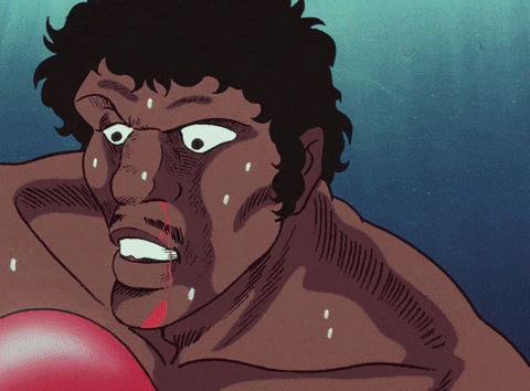 a cartoon of a man wearing red boxing gloves with the letter m on them