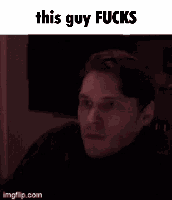 a close up of a man 's face with the words `` this guy fucks '' written above him .