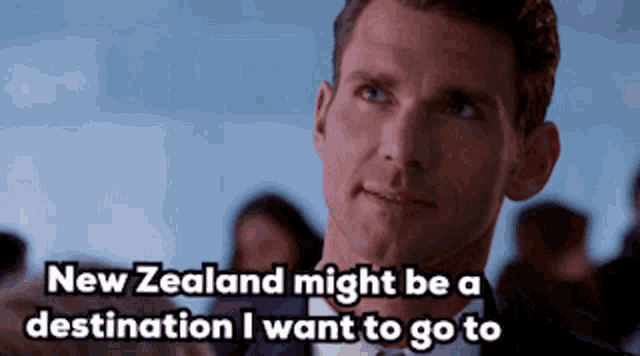 a man in a suit and bow tie says new zealand might be a destination i want to go to