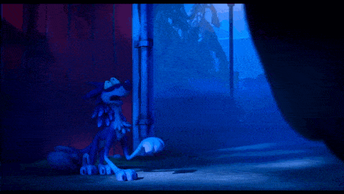 a cartoon character is upside down in a dark room