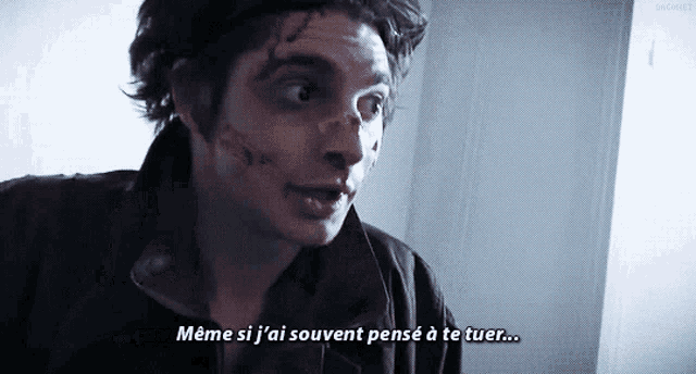 a man with a bandage on his face says meme si j ai souvent pense a te tuer