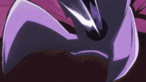 a close up of a purple and black object with the word wow on it
