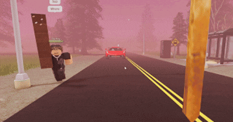 a red car is driving down a road with a sign that says where on it