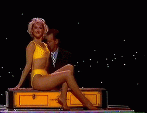 Magician Assistant GIF - Magician Assistant Sawing GIFs