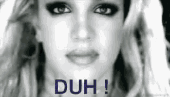a close up of a woman 's face with the words duh written below her