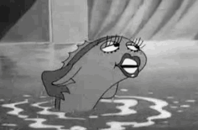a black and white cartoon of a fish with a woman 's face is swimming in the water .