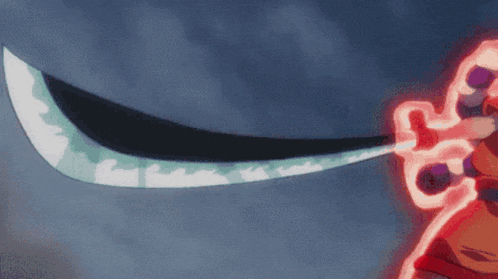 a person is holding a sword in their hand and it is glowing red