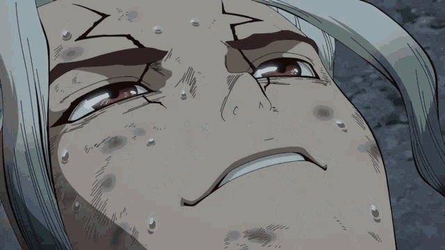 a close up of a woman 's face with sweat coming out of her eyes