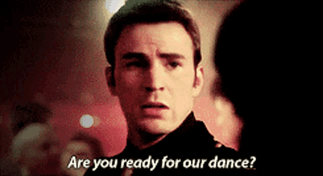 a man is asking another man if he is ready to dance
