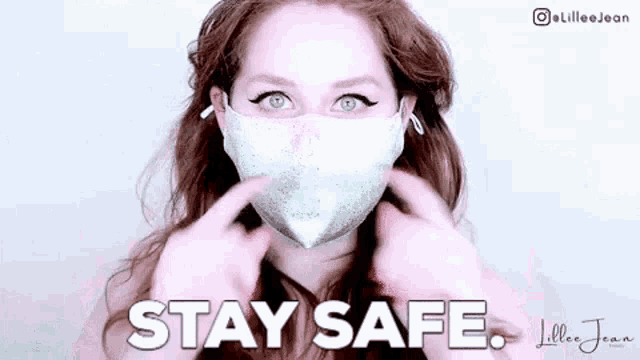 a woman wearing a face mask with the words `` stay safe '' written above her .