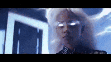 a close up of a person 's face with a lightning bolt coming out of her eyes .