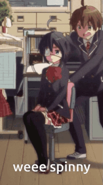 a girl in a school uniform is sitting on a chair next to a boy in a suit with the words wee spinny below her