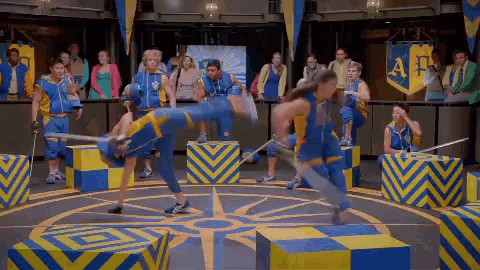 a group of people are playing a game with a banner that says a.f.
