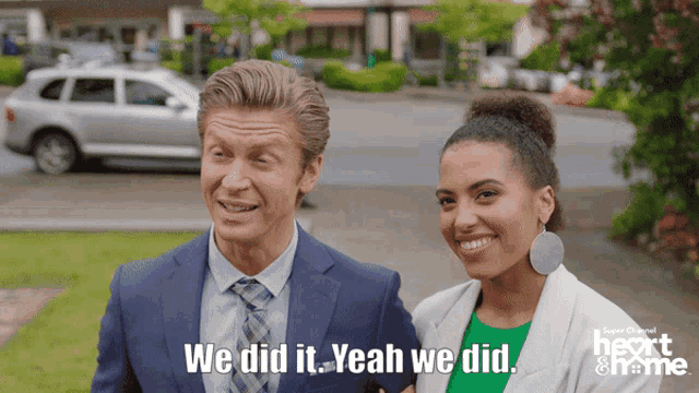 a man and a woman are standing next to each other and the man says we did it