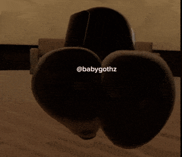 a picture of a stuffed animal with the name babygothz written on it