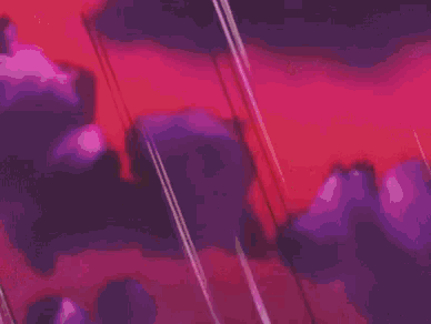 a close up of a person 's face in a cartoon with a red background .