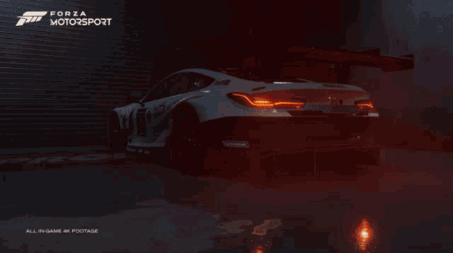 a forza motorsport car is parked in a dark garage