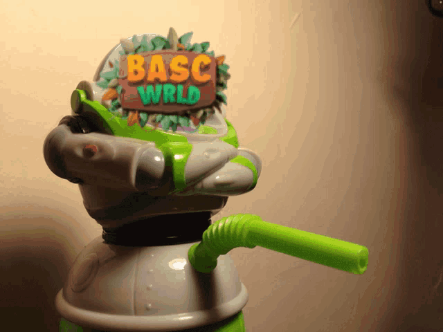a toy with a sign that says basc world on it