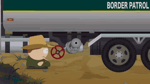 a man in a cowboy hat is standing next to a truck that says border patrol