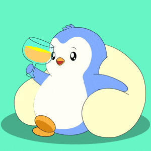 a penguin is sitting on a pink bean bag chair and holding a glass of wine