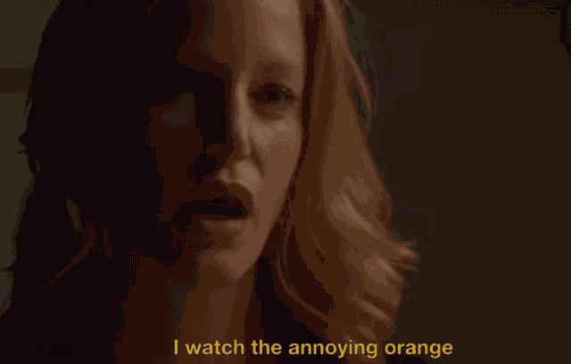 a woman says i watch the annoying orange in yellow letters