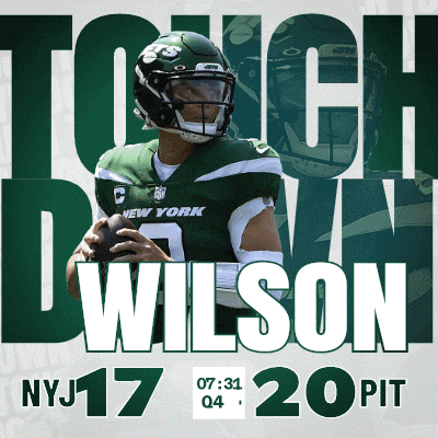 a new york jets player named wilson is holding a football