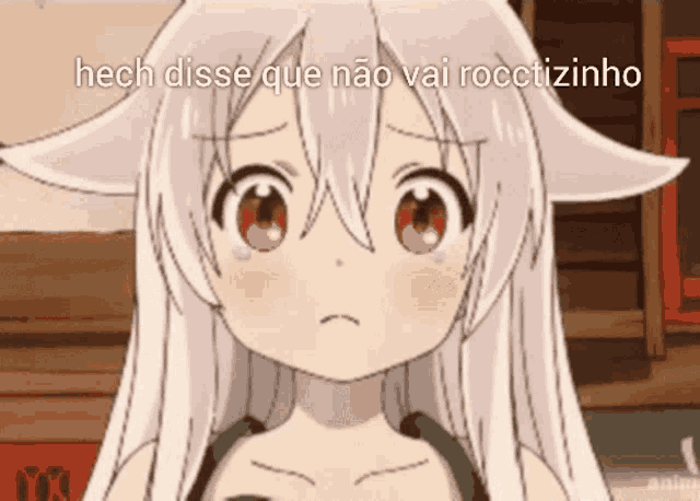a crying anime girl with the words hech disse que nao vai roctizinho written below her